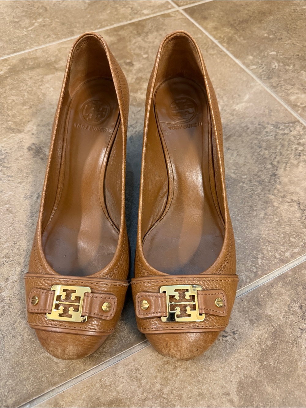 Tory Burch Cognac Leather Logo Cap-Toe Heels- worn on the front